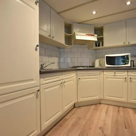 With Private Garden And Terraces *